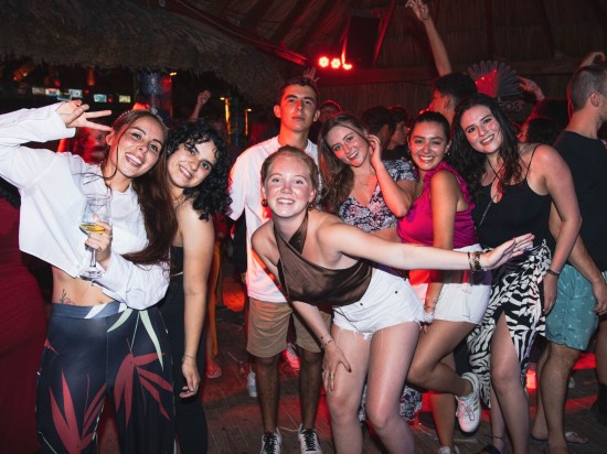 Light Up Your Night at Our Neon Holiday Beach Party!